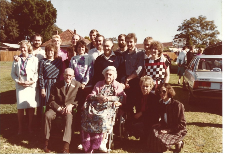 Harriett on her 100th Birthday with all her Grandchildren and eldest son Stan.
