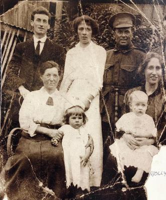 On her mother’s knee is Molly Scott (my mother). Her mother’s name was Anne Veronica. To the left of her is grandfather’s brother, Horatio Scott. My grandfather, Harry Scott, is pictured at the top left hand corner. In front of her is my great Grandmother