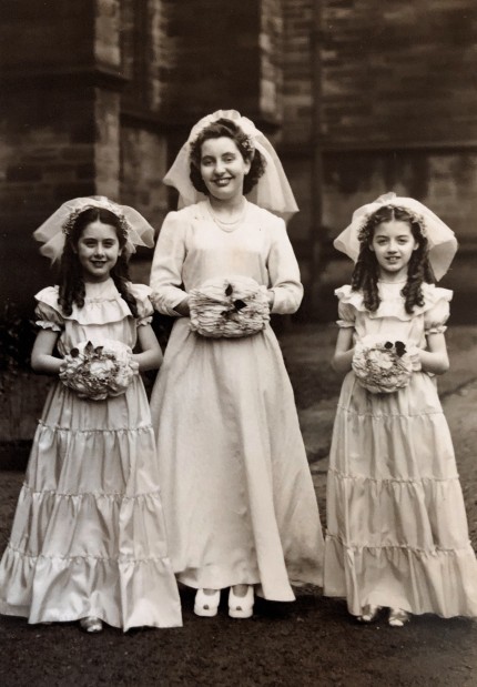 Wendy Edwards and I as flower girls for Barbara Jackson's (centre) wedding.