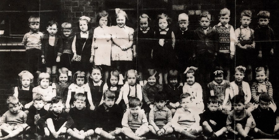An early primary school photo - That's me, 2nd row, fourth from the right