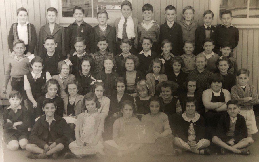Grade 4, Wickham Primary School (1951). Back row from left: Bruce Woods, Winwood Emmet Renshaw, John Felteff, unknown, Jimmy Hayden, Cecile Gail, Ronny Maguire, Alan Casey, Alan Starling, Doug Nye. 3rd Row from left: Allen Russell, Barry Baldock, unknown, Trevor Clarke, unknown, John Fordham, Gary Mace, unknown, unknown, Bobby Millard. 2nd row from left: Norma Flanagan, Miss Hopkins, Merlene Lawrence, unknown, Janice Peterson, unknown, Judith Digs, unknown. Next row: John Elbourne, unknown for rest of row aside from Dennis Kibble on the far right. Front row: Kelly Mickelborough, Jan Frewin, Jenny McKennie, unknown, unknown, Ronny Parrot.