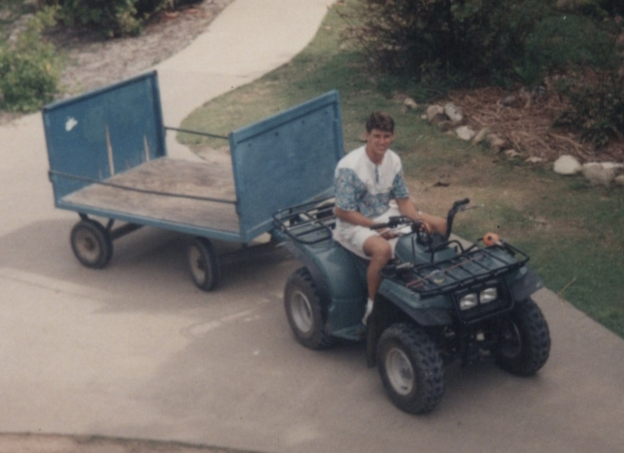 Adam working as a porter on Brampton Island