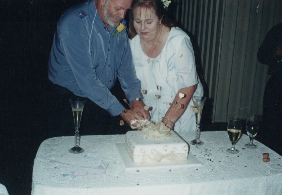 Cutting the cake (a wedding gift from Tracy)